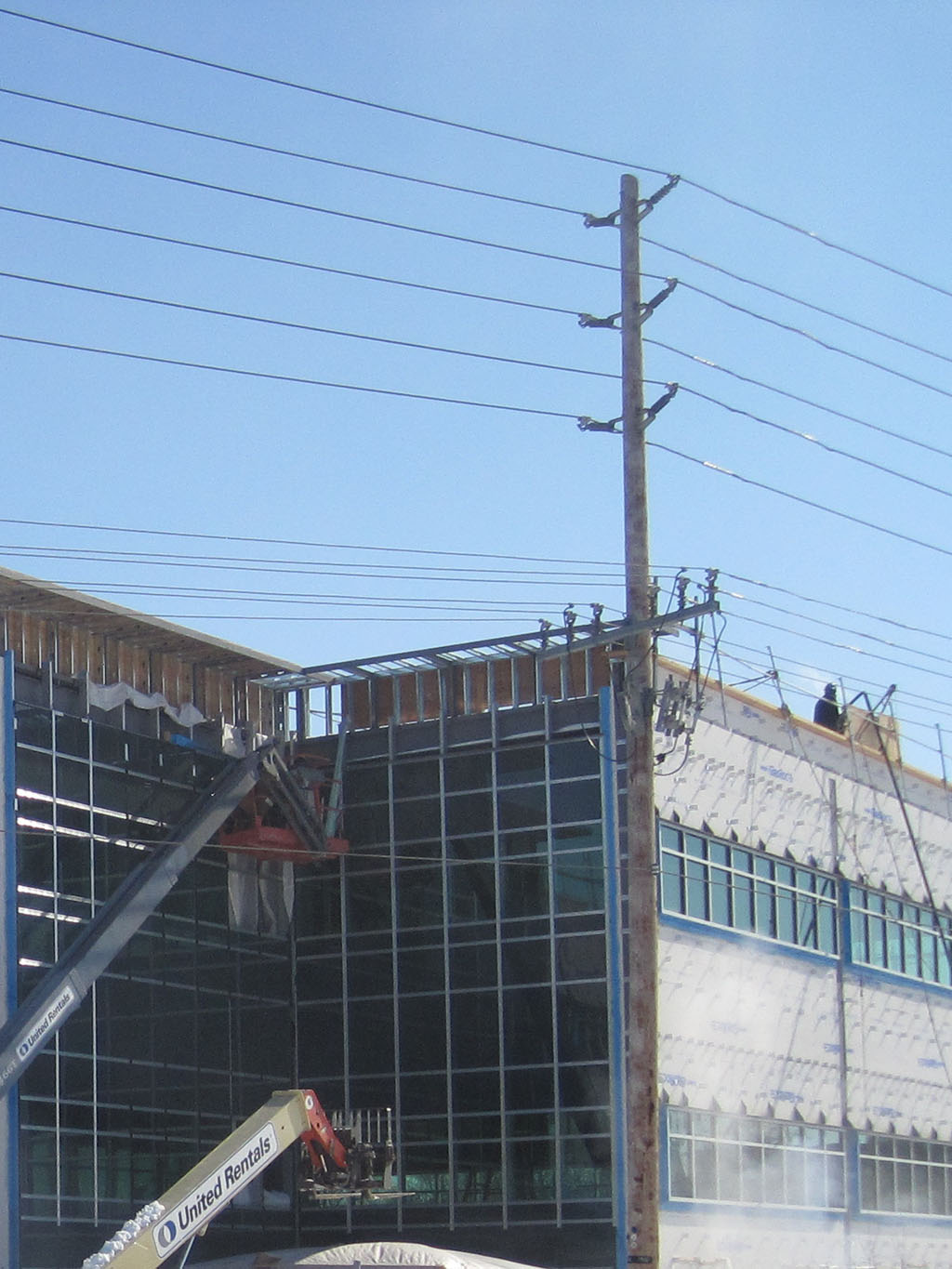 Springbank Medical 9 Exterior construction of the Springbank Medical Centre showing workers and equipment installing the upper façade.