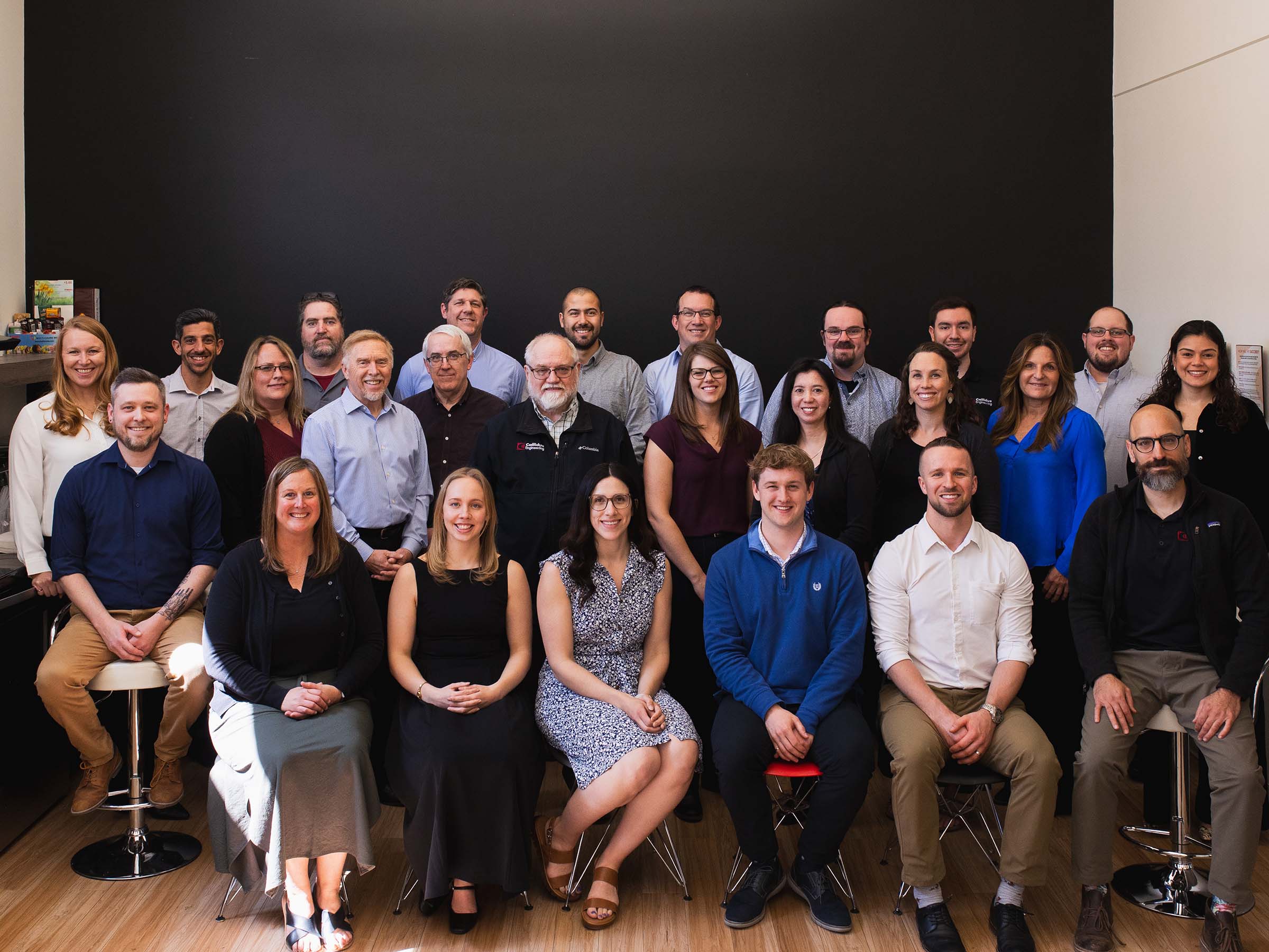 Callidus Engineering’s London team gathered for a group photo in an office setting.